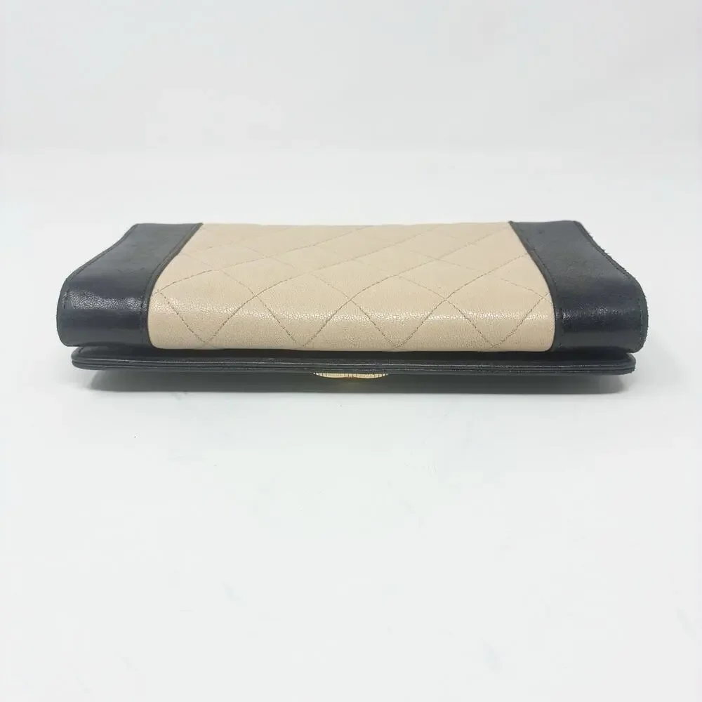 Chanel Mademoiselle Quilted Wallet in Black and Beige